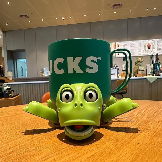 Funny turtle-shaped coaster holding a coffee mug